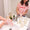 Washing hands with a refillable soap